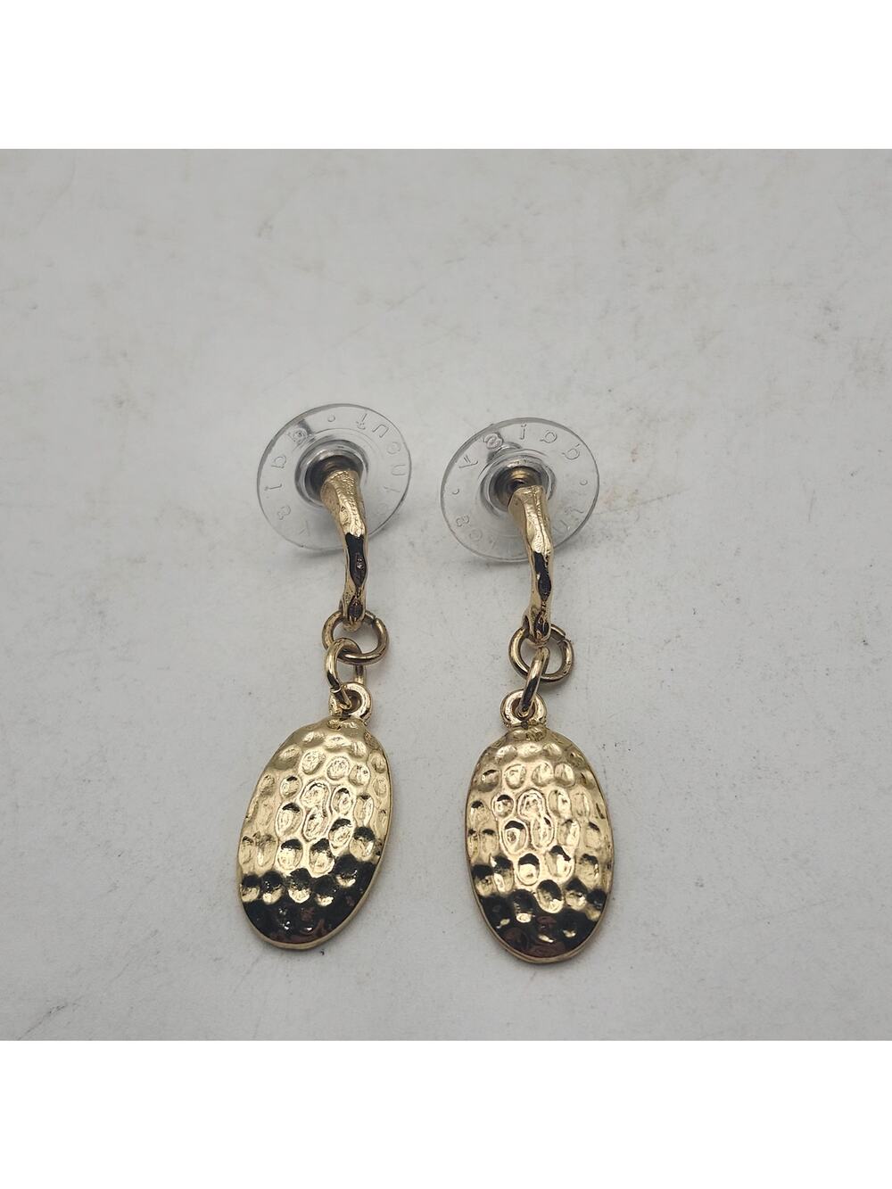 Daisy Fuentes Gold Tone Hammered Oval Drop Earrings Pierced Post Signed Textured
